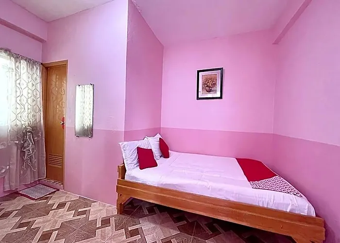Oyo 899 Merie Diz Sunrise Hotel