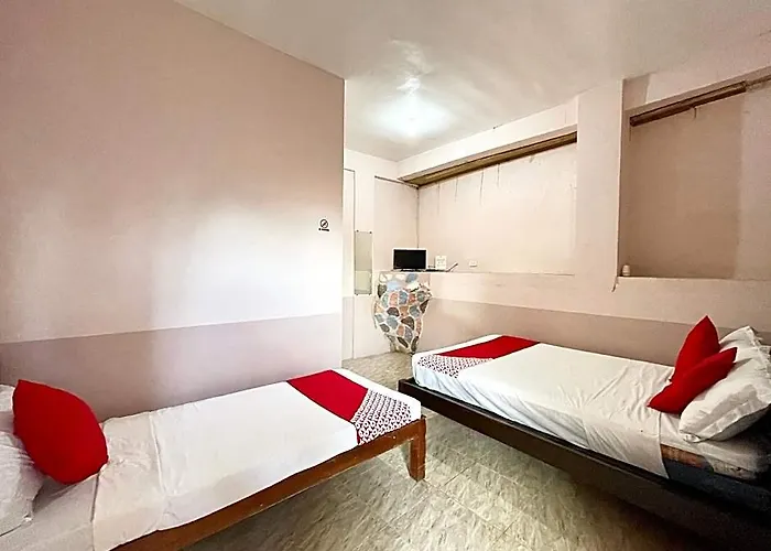 Oyo 899 Merie Diz Sunrise Hotel